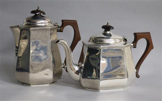 A George V silver teapot and hot water jug, William Neale & Son Ltd, Birmingham, 1930.